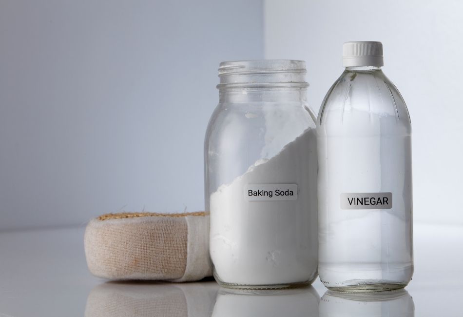 White vinegar and baking soda in a bottle