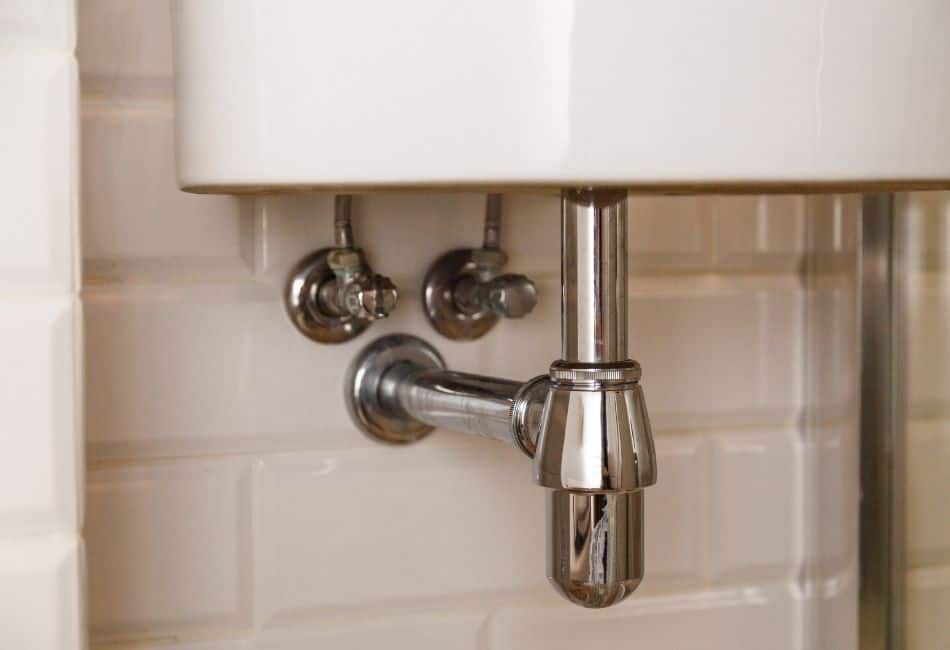 Wall mounted bathroom sink drain pipe