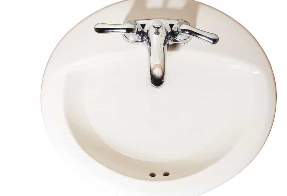 drop in bathroom sink two lever faucet