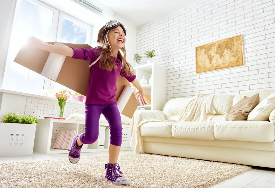 child playing in the living room