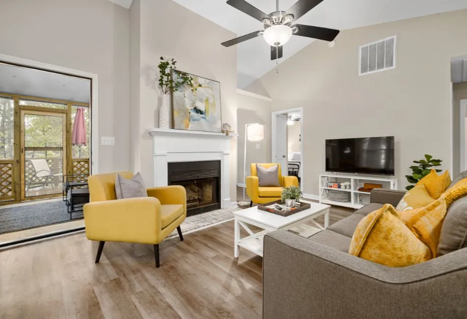 living room with yellow sofas