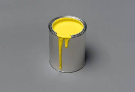 yellow oil based paint in can
